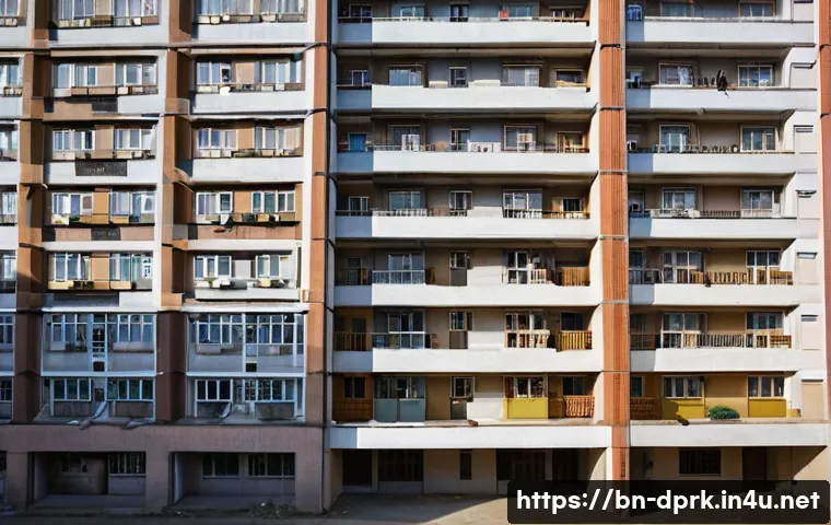 북한의 주거 형태   공동주택 구조 - A detailed, high-rise North Korean residential building complex showcasing multiple floors with smal...